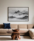 Ink-style mountain scene with layered hills, pagoda, and flock of birds, black and white landscape print.