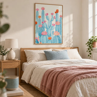 Cactus Art Print, framed on the wall of a calm bedroom in a UK flat with warm white walls and a pale wood floor