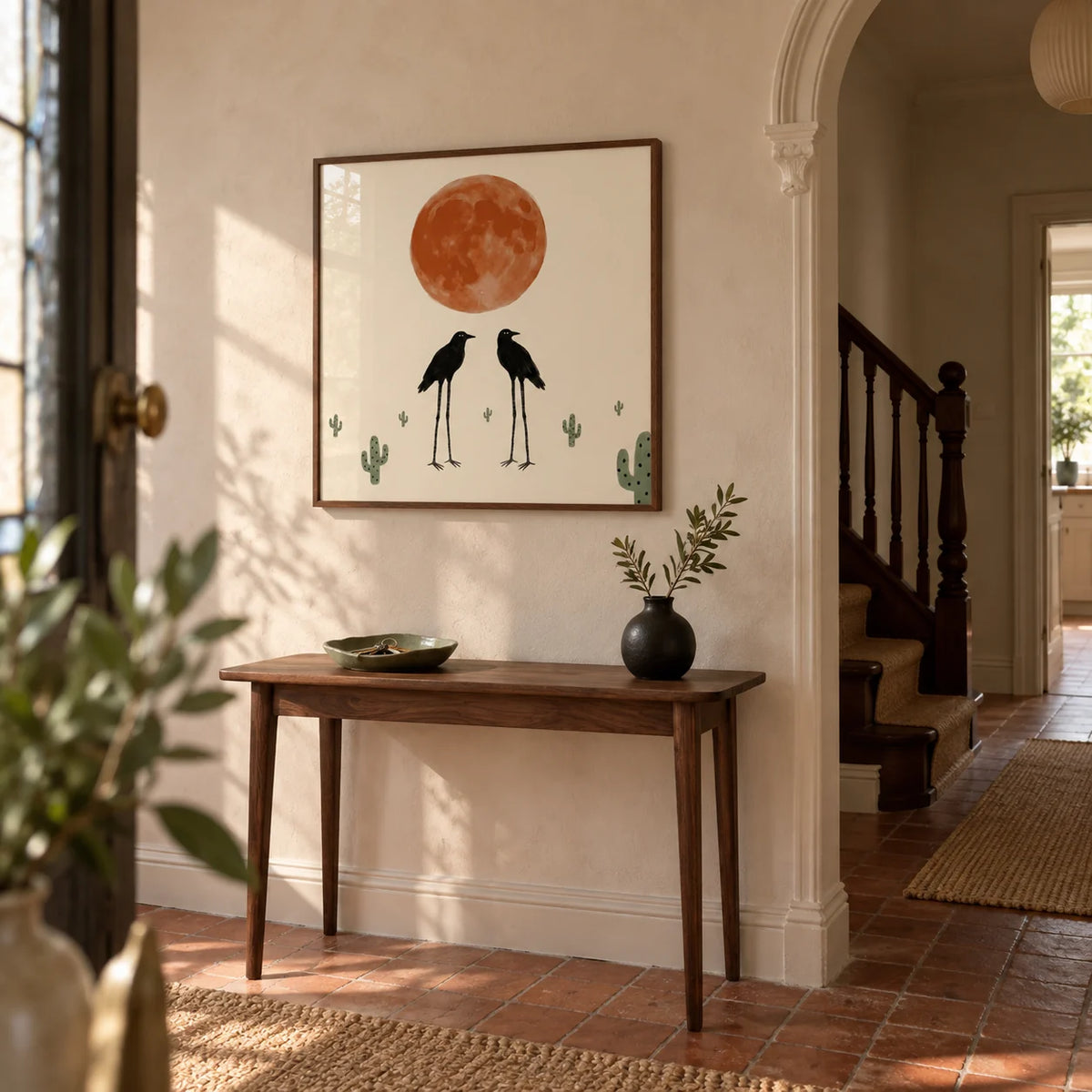 Cactus Bird Wall Art, framed on the wall of a welcoming hallway in a UK Victorian terrace with pale clay plaster walls and plain terracotta floor tiles