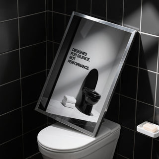Minimalist Funny Toilet Wall Art in monochrome bathroom setting.