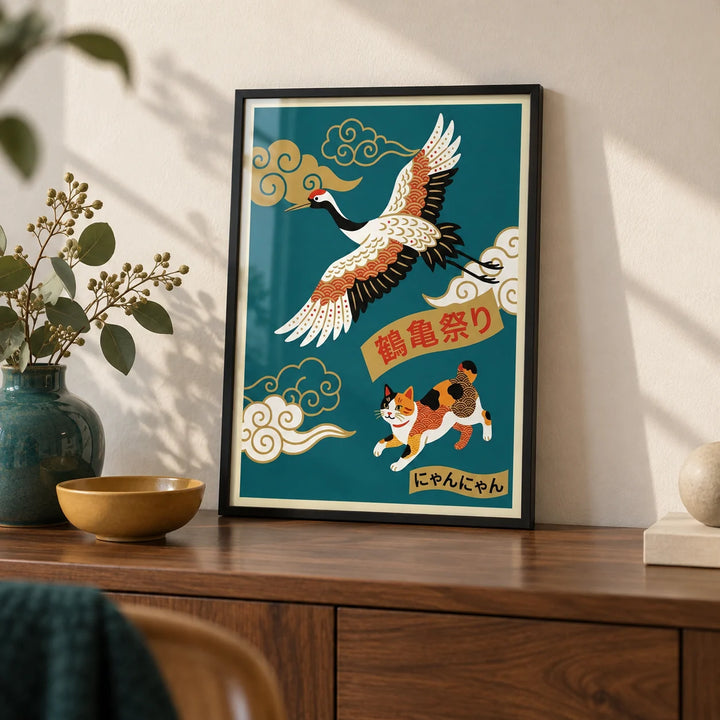 Calico Cat Poster, a small A4 framed print leaning on a walnut sideboard in a living room