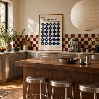 Cambridge Print, framed on the wall of a warm kitchen with a burgundy and cream checkerboard tile splashback and brushed steel cabinets