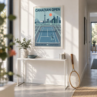 Canadian Open Tennis Art Print, framed on the wall of a bright hallway with a white wall and a pale grey floor