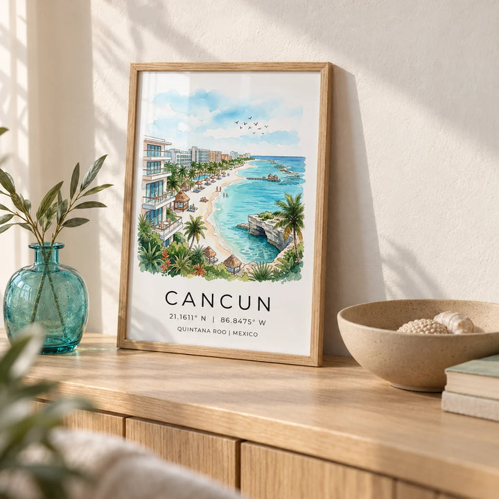 Cancun Beach Art Print, a small A4 framed print leaning on a pale oak sideboard in a living room