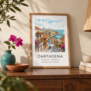 Cartagena Art Print, a small A4 framed print leaning on a walnut side table in a hallway