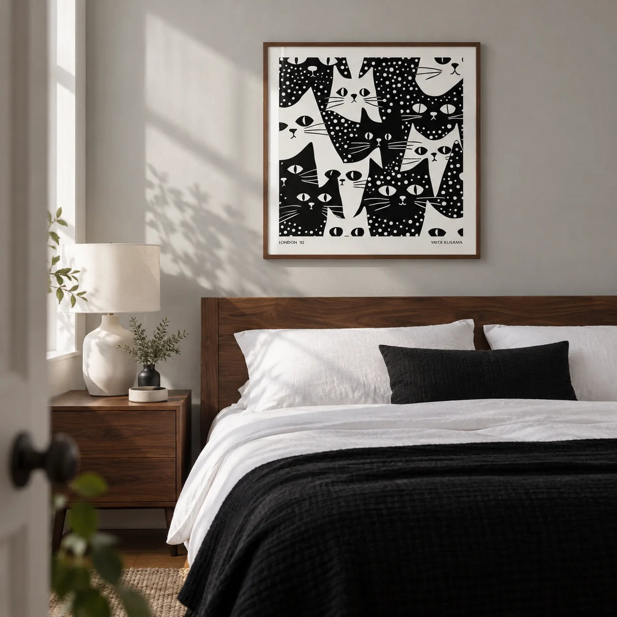 Cat Art Black and White, framed on the wall of a crisp contemporary bedroom in a terraced house with a pale grey wall