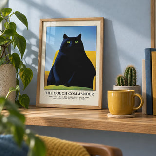 Cat Funny Poster, a small A4 framed print leaning on an oak shelf in a living room