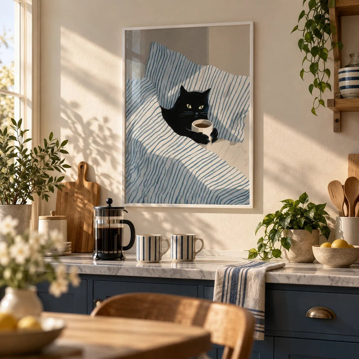 Cat in Bed Print, framed on the wall of a cosy kitchen corner