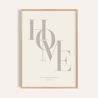 Framed print of Home Beige Personal Print with beige typographic letters in a wooden frame