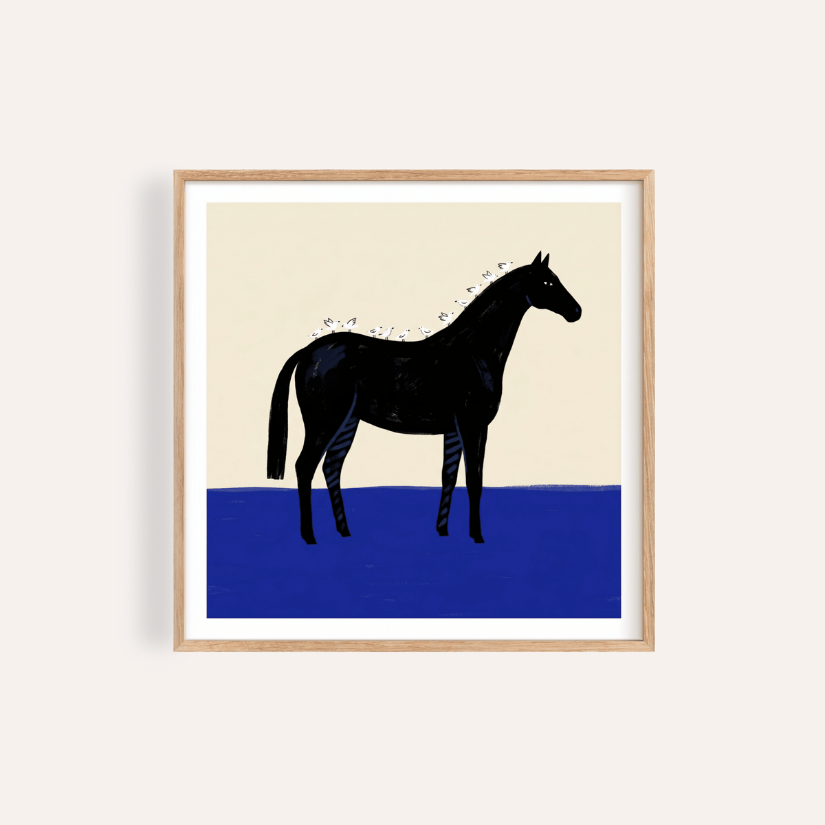 Black Horse Wall Art print framed against beige wall