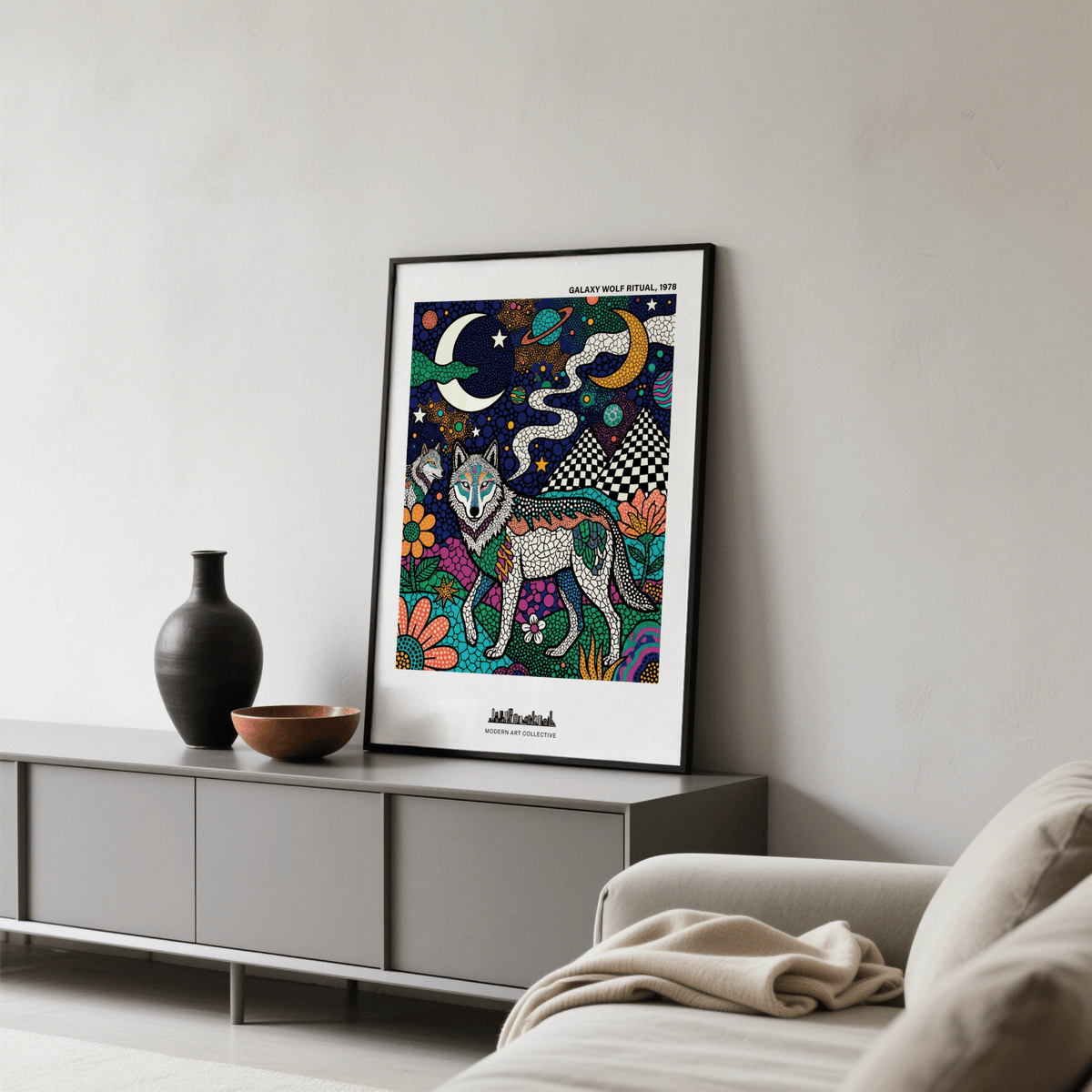 Top section of galaxy poster print with crescent moon, ringed planet, and star shapes