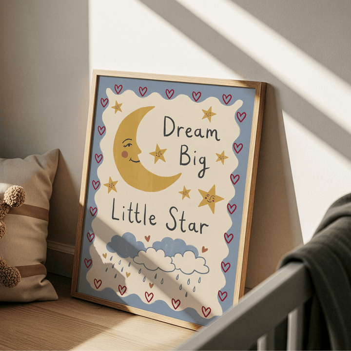 Framed Dream Big Art Print leaning against a wall with soft natural light casting shadows