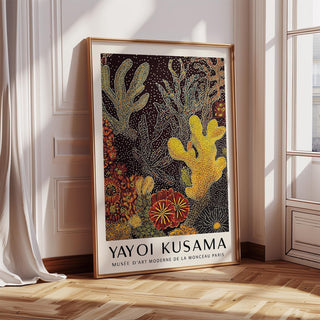 Coral reef art print with yellow and red marine forms on a dark background.