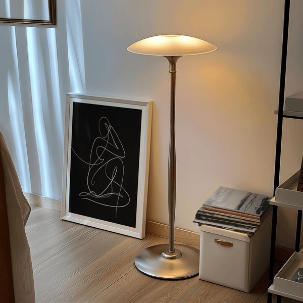 Graphic black backdrop with continuous white outline of seated body