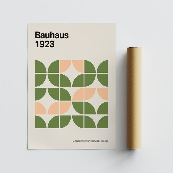 Cream backdrop highlights bold green and blush forms in this wall art.