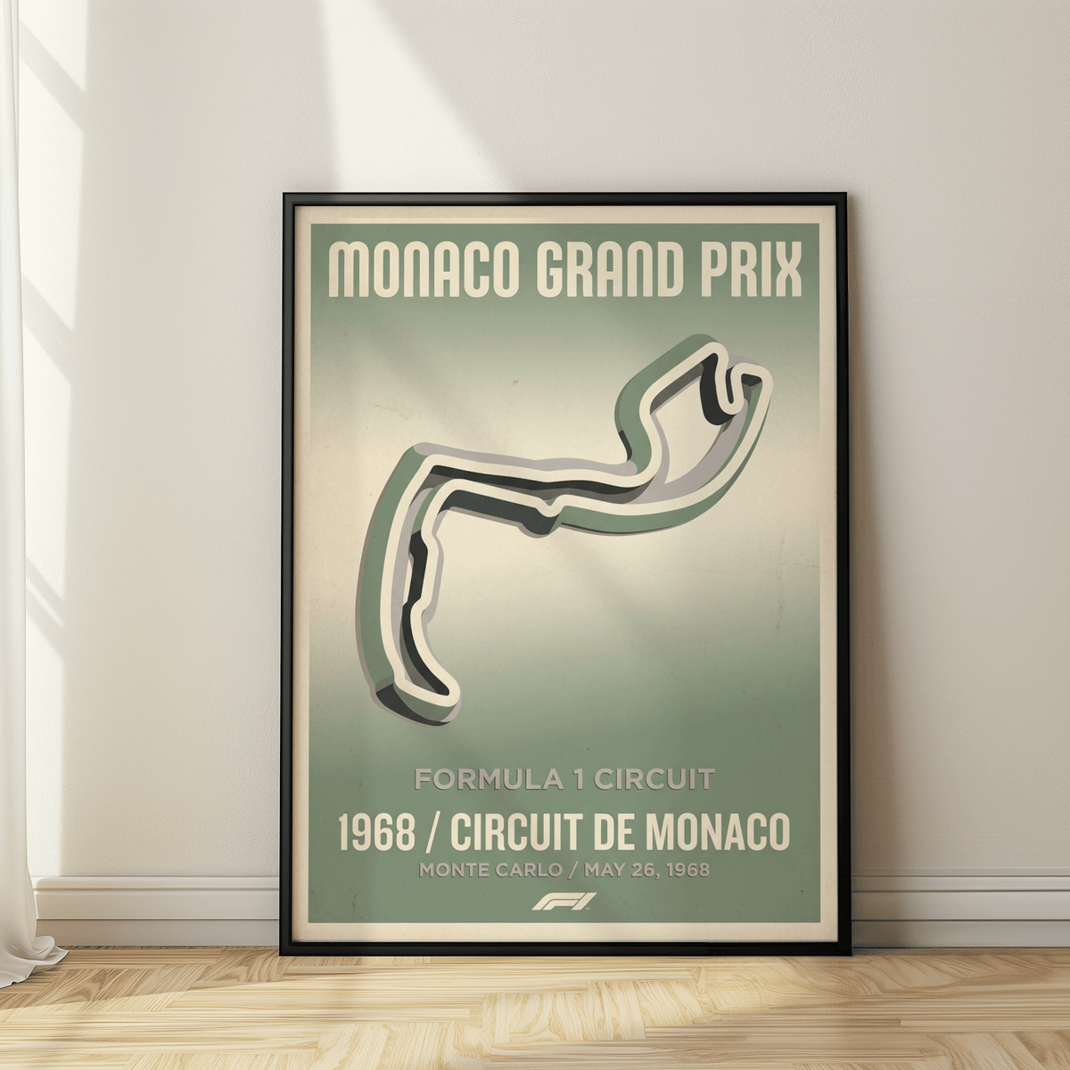 Monaco Grand Prix Art Print framed above desk, retro headline visible