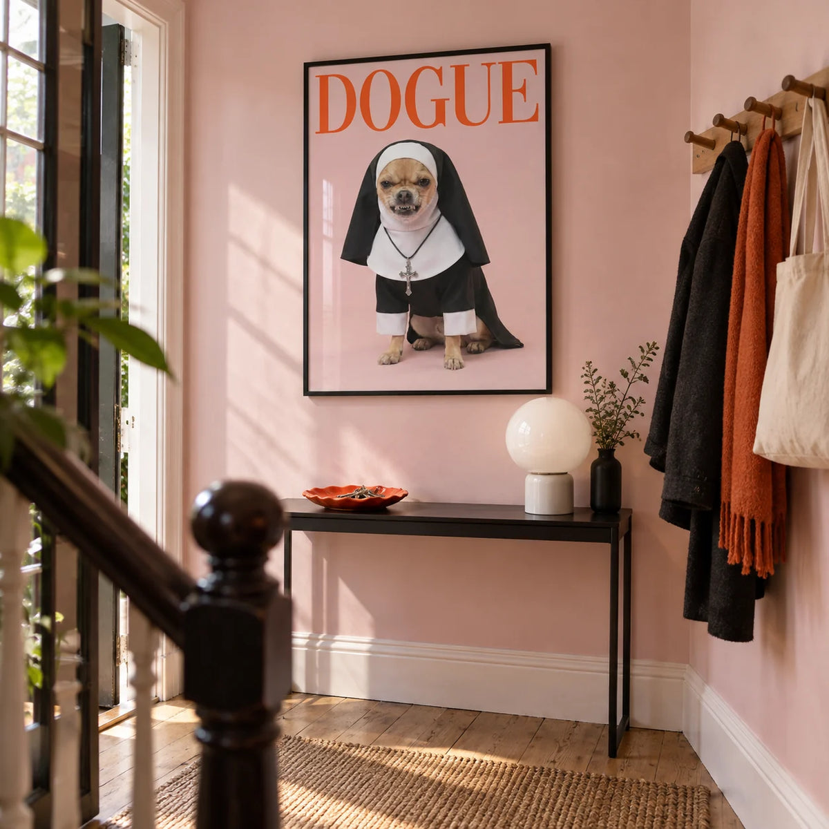 Chihuahua Nun Costume Art, framed on the wall of a characterful hallway in a renovated UK terrace with pale pink walls and a plain timber floor