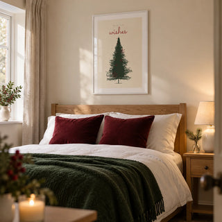 Christmas Tree Print, framed on the wall of a cosy Christmas guest bedroom in a UK home with soft cream walls