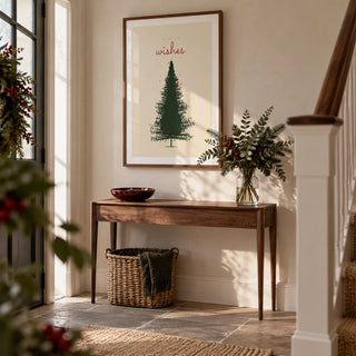 Christmas Tree Print, framed on the wall of a welcoming Christmas hallway in a UK family home with pale plaster walls and simple painted woodwork
