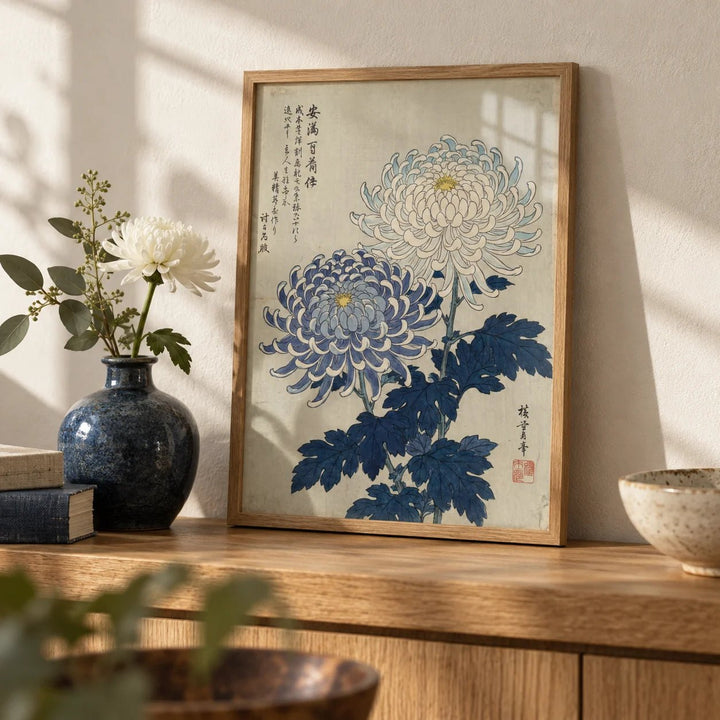 Chrysanthemum Art, a small A4 framed print leaning on an oak shelf in a living room