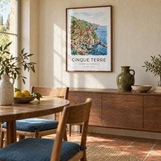 Cinque Terre Art Print, framed on the wall of a sunlit dining room in a characterful UK home with warm cream plaster walls and terracotta floor tiles