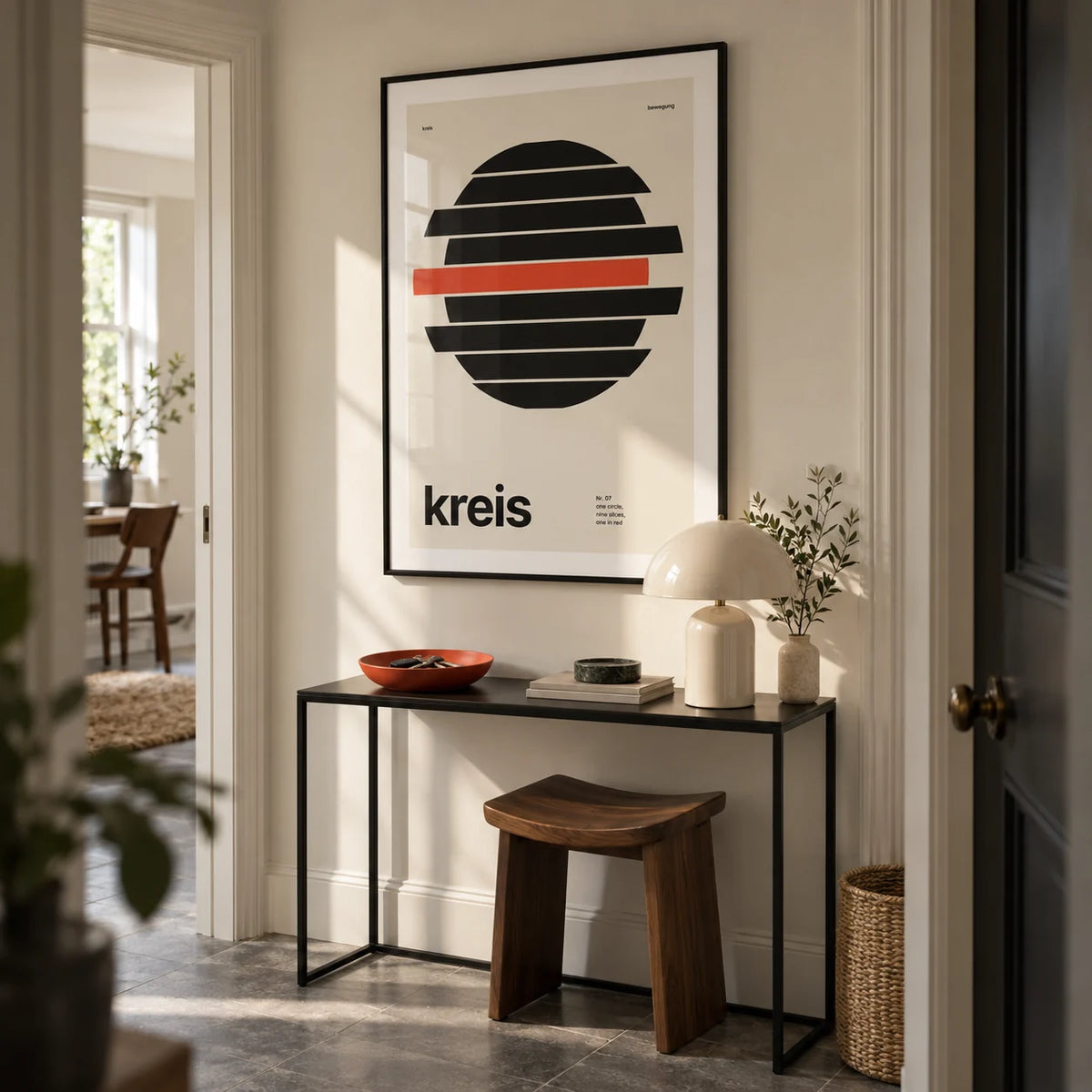 Circle Print, framed on the wall of a compact architectural hallway in a UK first flat for a design enthusiast (25-35)