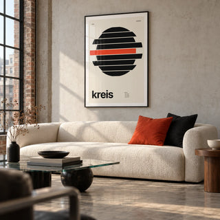 Circle Print, framed on the wall of a modern living room in a converted UK warehouse flat with a pale concrete wall and tall windows