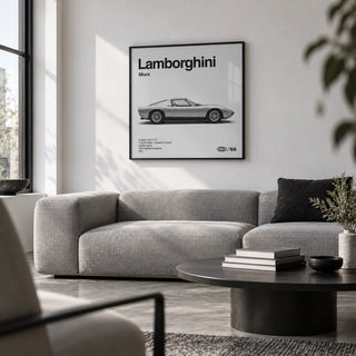 Classic 1960s Supercar Poster, framed on the wall of a monochrome city flat living room with a white wall and a polished concrete floor