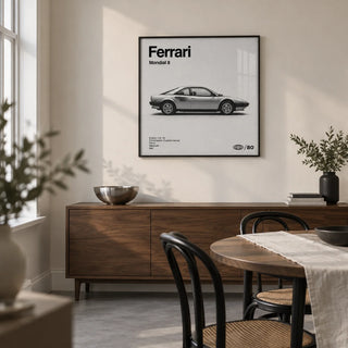 Classic 1980s Italian Coupe Poster, framed on the wall of a modern dining room in a UK townhouse with a warm white wall and a plain grey floor