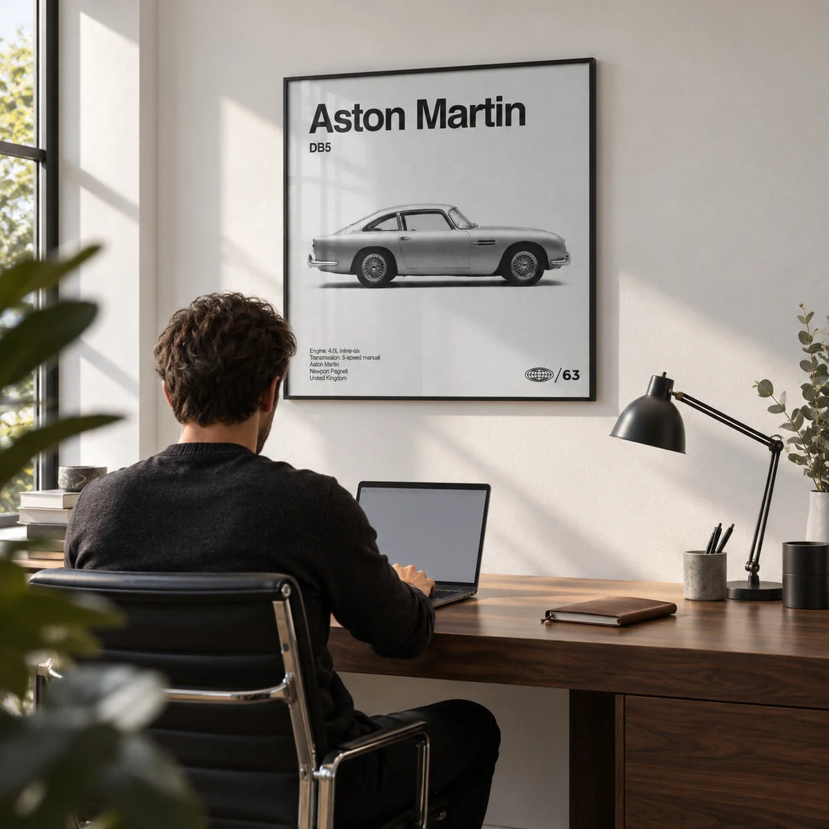Classic British Grand Tourer Poster, framed on the wall of a smart modern home office with a white wall