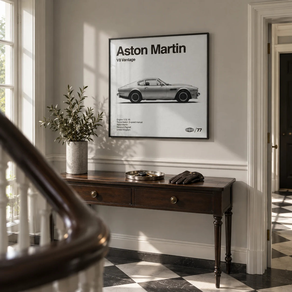Classic British Muscle Coupe Poster, framed on the wall of a Georgian style hallway with a pale stone grey wall and a plain black and white floor