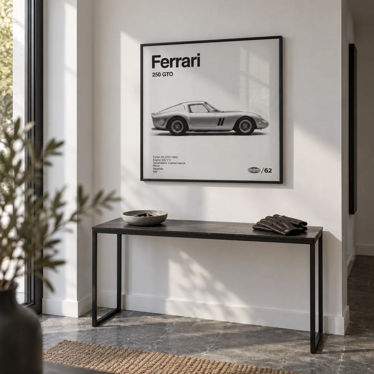 Classic Grand Tourer Poster, framed on the wall of a crisp entrance hall with a white wall and a grey stone floor