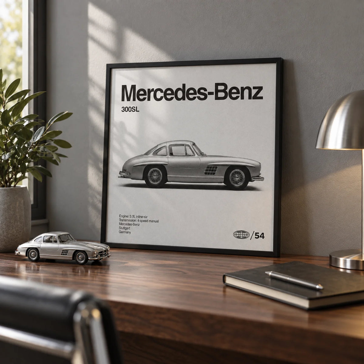 Classic Gullwing Sports Car Poster, a small A4 framed print leaning on a walnut desk