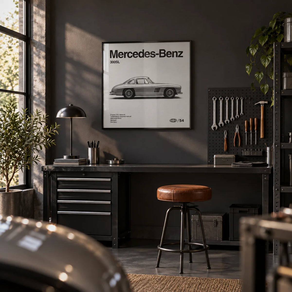Classic Gullwing Sports Car Poster, framed on the wall of a smart converted garage den with a charcoal painted wall and a dark grey floor