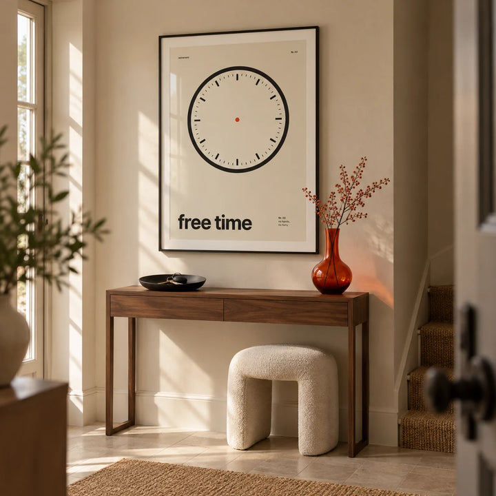 Clock Print, framed on the wall of a compact entrance hallway in a design-conscious UK home with warm beige walls and a plain pale stone floor
