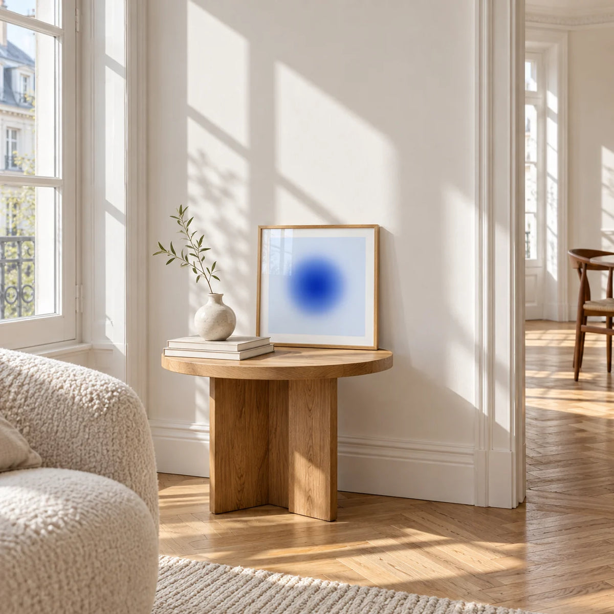 Cobalt Blue Wall Art, a small square framed print leaning on a small solid oak side table