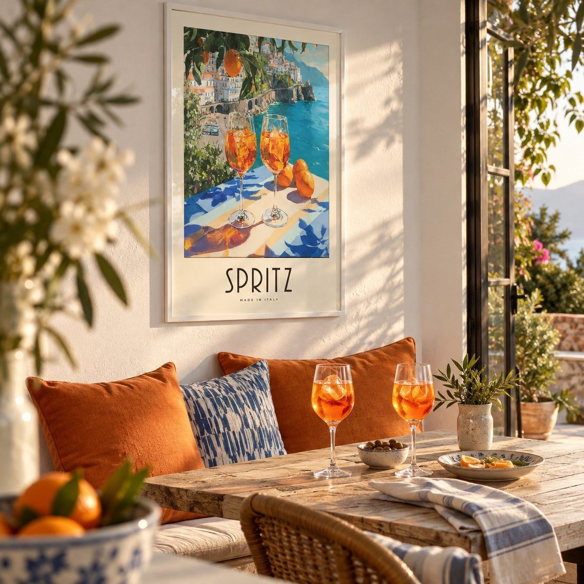 Cocktail Art Decor, framed on the wall of a dining nook by open garden doors