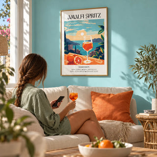 Cocktail Art Poster, framed on the wall of a summery living room with a soft turquoise painted wall