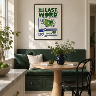 Cocktail Art Print, framed on the wall of a compact dining nook in a renovated UK flat with a forest green built-in banquette and an ivory wall