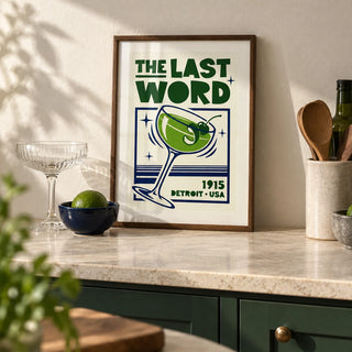 Cocktail Art Print, a small A4 framed print leaning on a pale stone kitchen worktop
