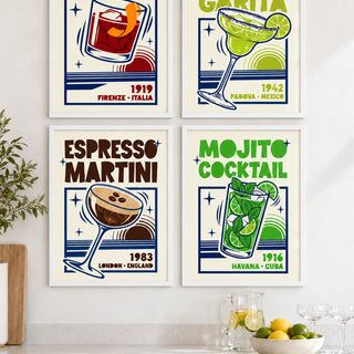 Cocktail Posters Set hung at eye level above a white kitchen worktop: Negroni Cocktail Print, Margarita Art Print and Espresso Martini Print shown framed side by side (frames not included)