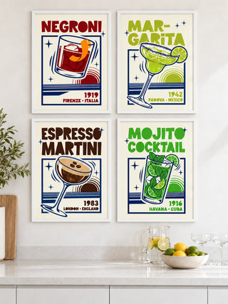 Cocktail Posters Set hung at eye level above a white kitchen worktop: Negroni Cocktail Print, Margarita Art Print and Espresso Martini Print shown framed side by side (frames not included)