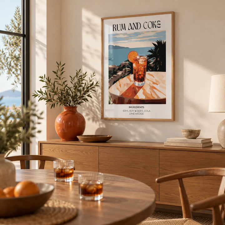 Cocktail recipe poster, framed on the wall of a relaxed dining room with a soft cream wall