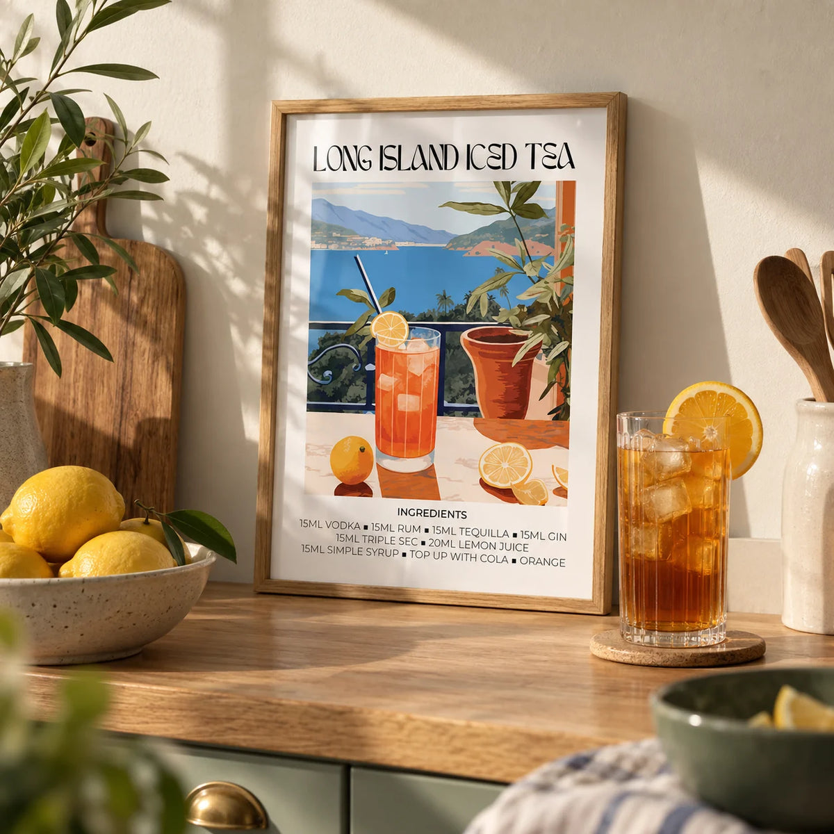 Cocktail Wall Art, a small A4 framed print leaning on an oak kitchen worktop
