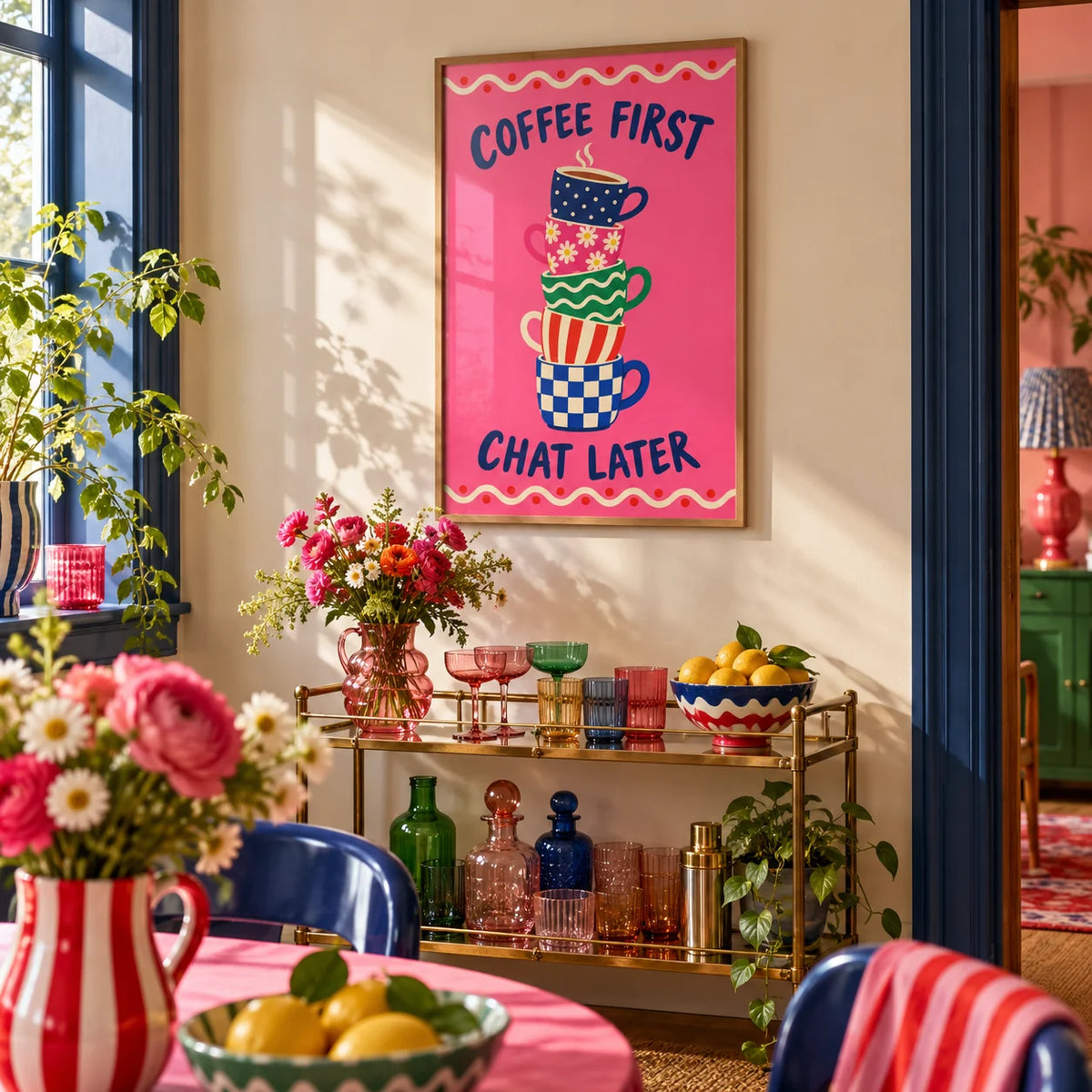 Coffee First Print, framed on the wall of a colourful dining corner