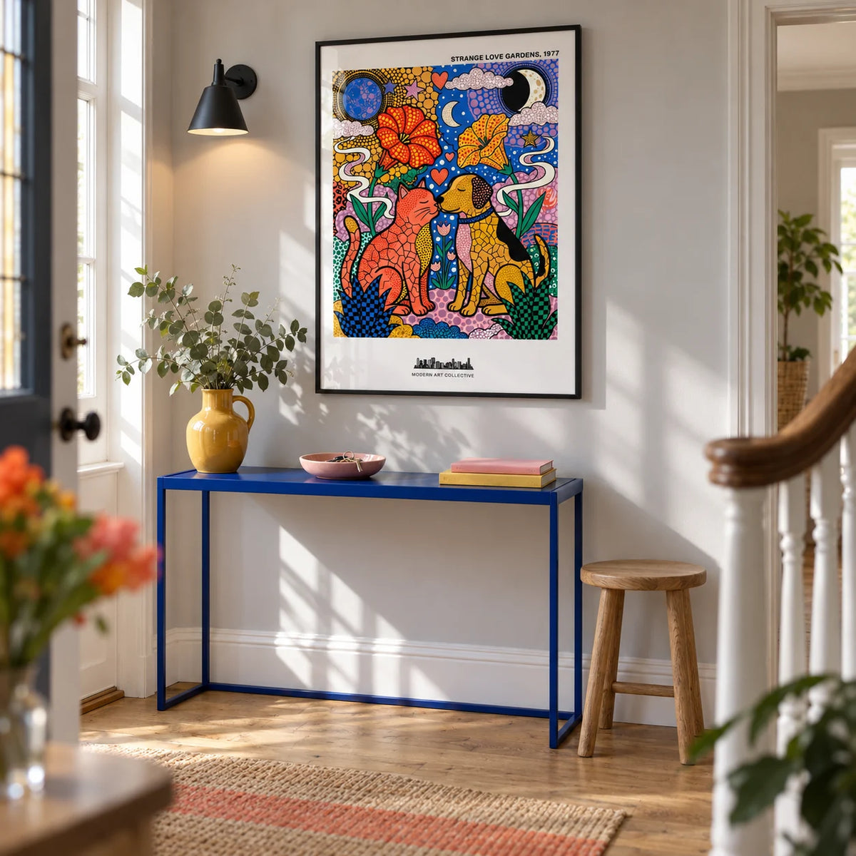 Colorful Animal Art Print, framed on the wall of a bright entrance hallway in a renovated UK terrace with pale grey walls and simple oak floorboards