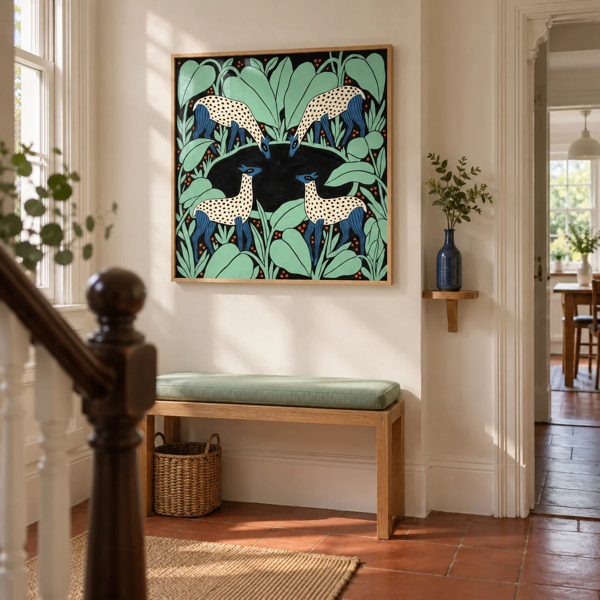 Colorful Animal Wall Art, framed on the wall of a bright hallway in a Victorian UK terrace with a pale cream wall and plain terracotta floor