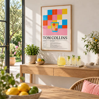 Colorful Bar Prints, framed on the wall of a bright garden room with glass doors and a white wall in a hallway