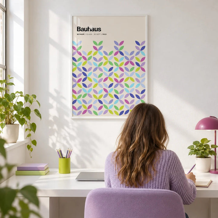 Colorful Bauhaus Poster, framed on the wall of a bright modern home office with a white wall