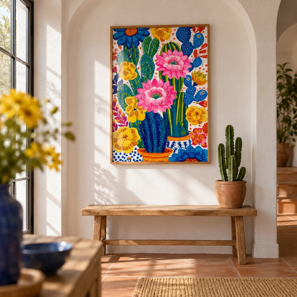 Colorful Botanical Wall Art, framed on the wall of a bright hallway with a white plaster arched niche and a plain terracotta floor